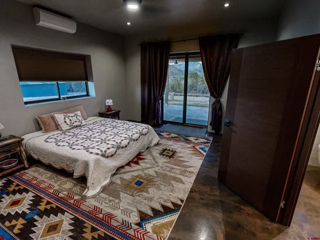 a living room with couch and a table