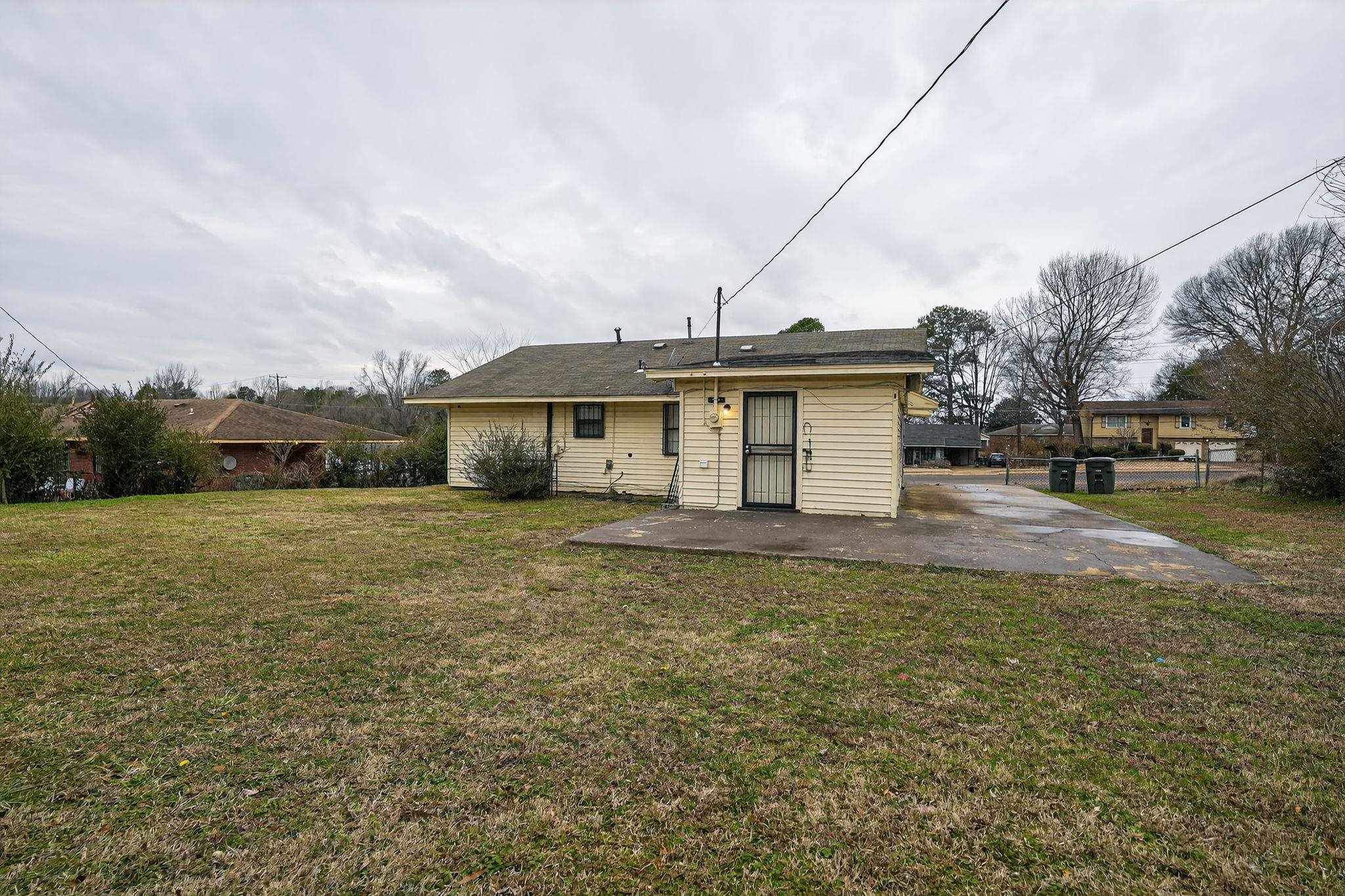 4566 Weaver Road Memphis, TN 38109 - Photo 30 of 32 a view of a house with backyard and garden