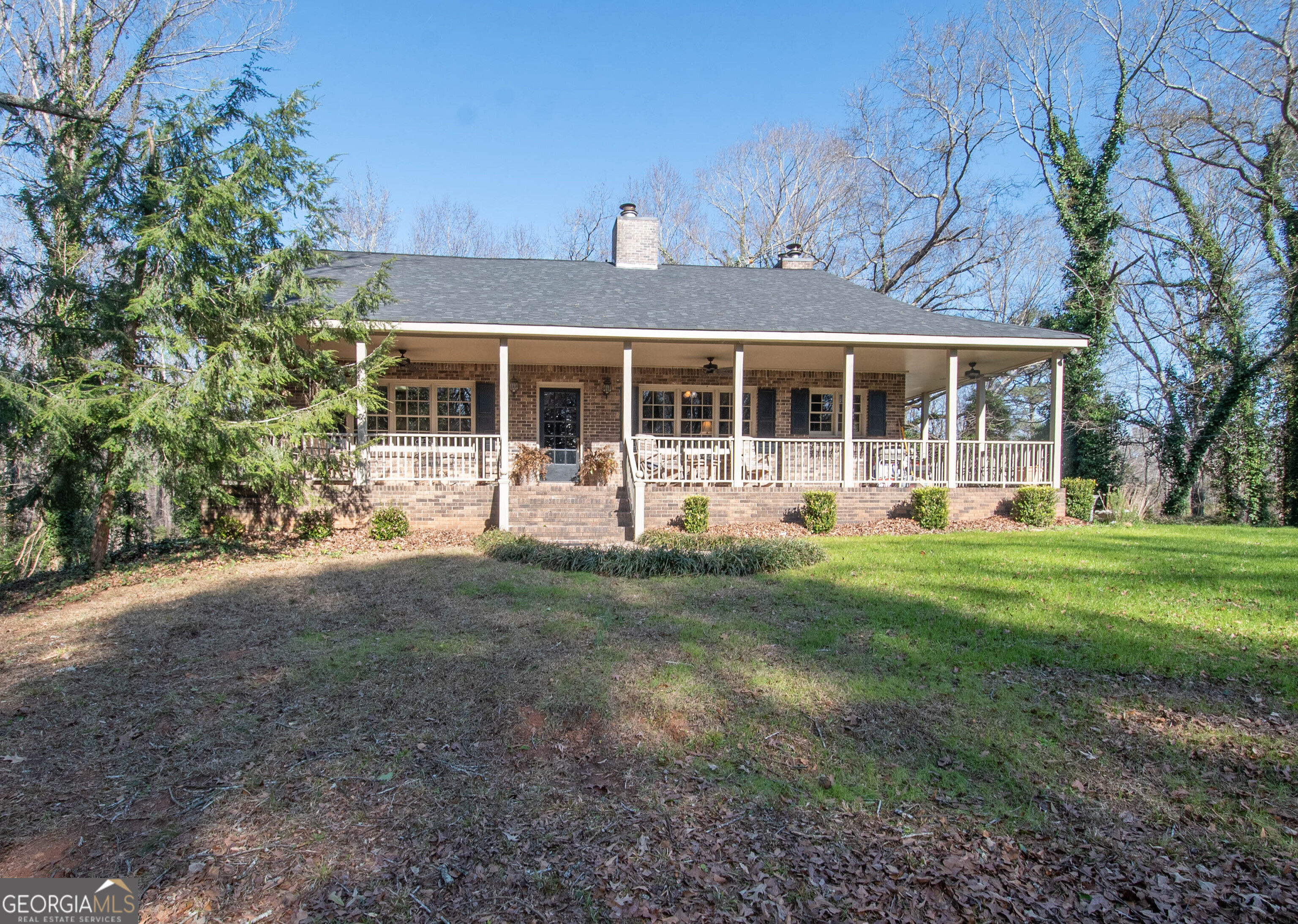151 Evans Road Milner, GA 30257 - Photo 31 of 53 front view of a house with a yard