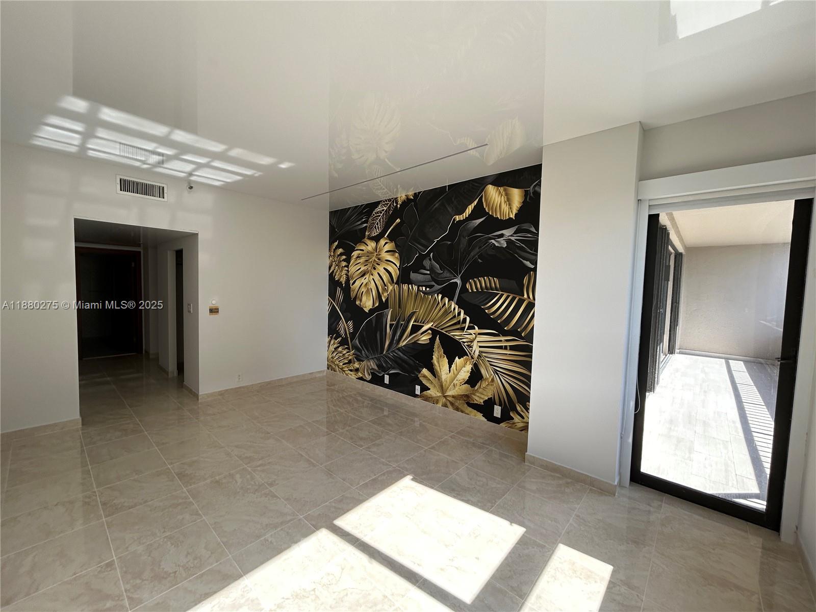251 Crandon Boulevard, Unit 424 Key Biscayne, FL 33149 - Photo 14 of 22 an entryway with a fan and a window
