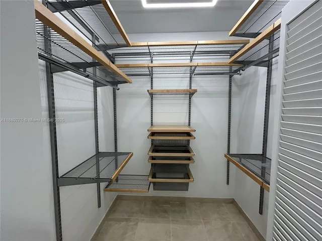 a bathroom with a glass door