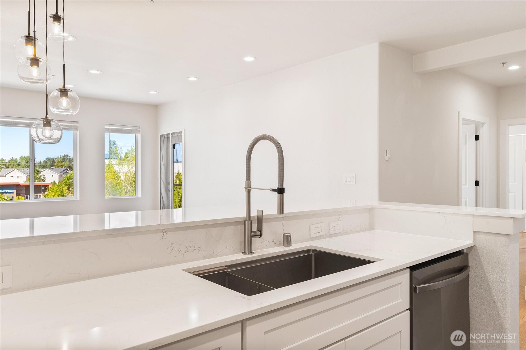 14915 38th Drive Southeast, Unit F3011 Bothell, WA 98012 - Photo 6 of 40 a kitchen with a sink and a window