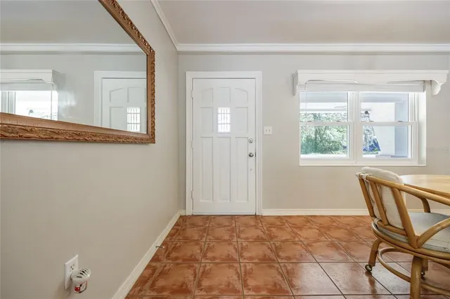 a view of an empty room and window