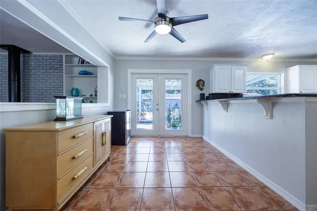 a kitchen with a cabinets and window
