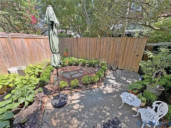 a garden view with a seating space