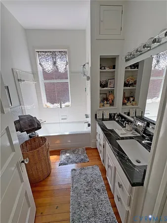 a kitchen with a stove and a sink