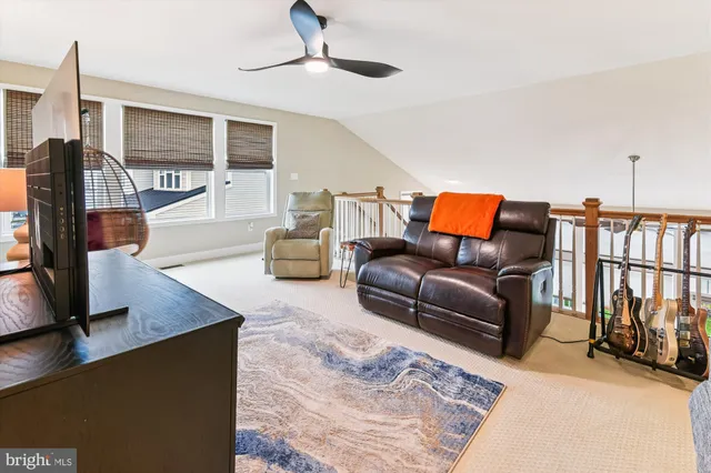 a picture of a bench in front of a wall