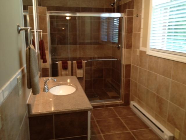 3696 Bowker Road Charlotte, TN 37036 - Photo 4 of 18 You must see this custom bath. Huge custom designed shower.New tile flooring,lighting, windows. Lawndry room. Attention to detail throughout this home.MUST see to appreciate.