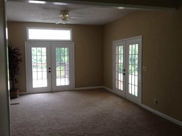 3696 Bowker Road Charlotte, TN 37036 - Photo 7 of 18 Master bedroom has this large sitting area with TWO sets of french doors. Open and huge.