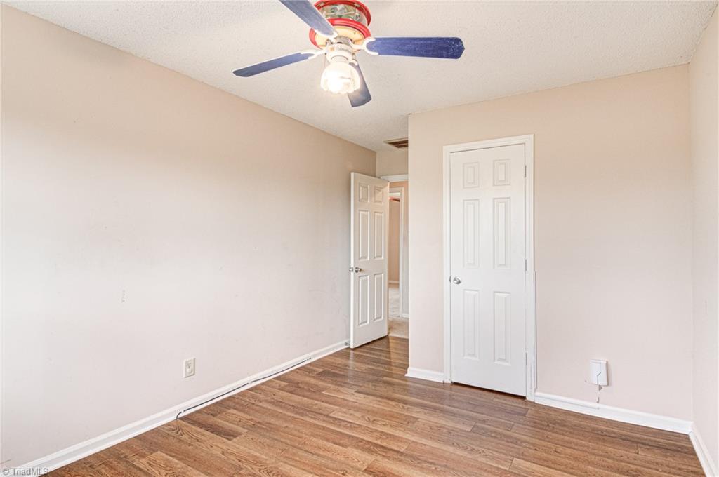 7816 Athens Road Stokesdale, NC 27357 - Photo 22 of 38 Third bedroom