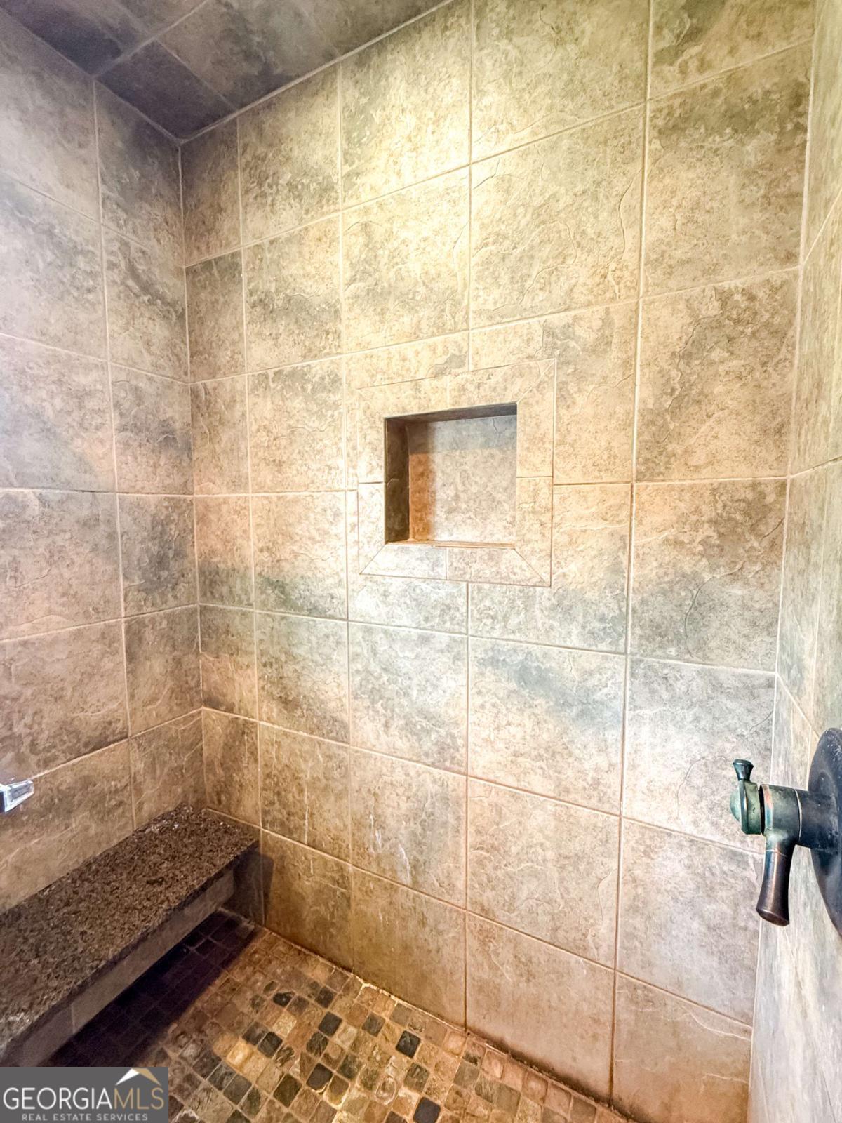 371 Burketts Ferry Road Hazlehurst, GA 31539 - Photo 43 of 53 a bathroom with a shower