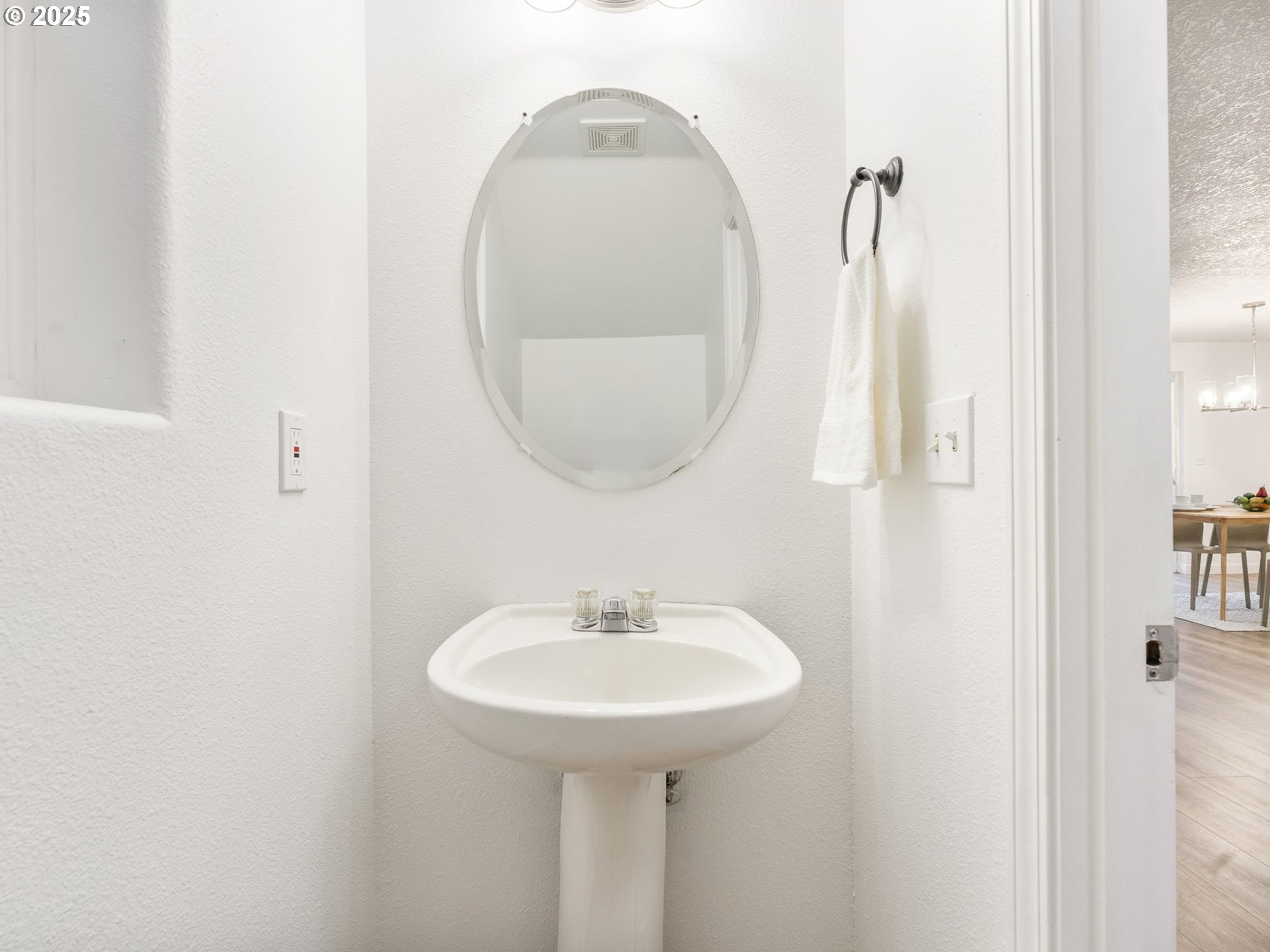 20744 Southwest Bingo Lane Beaverton, OR 97006 - Photo 15 of 26 a bathroom with a sink and a mirror