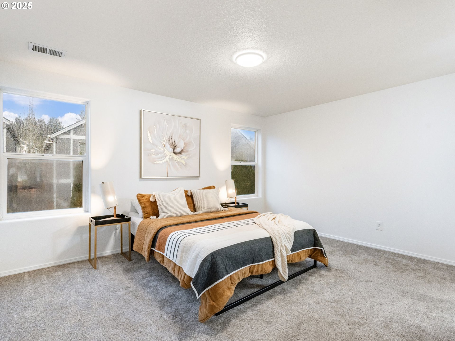 20744 Southwest Bingo Lane Beaverton, OR 97006 - Photo 16 of 26 a bedroom with a bed and a couch