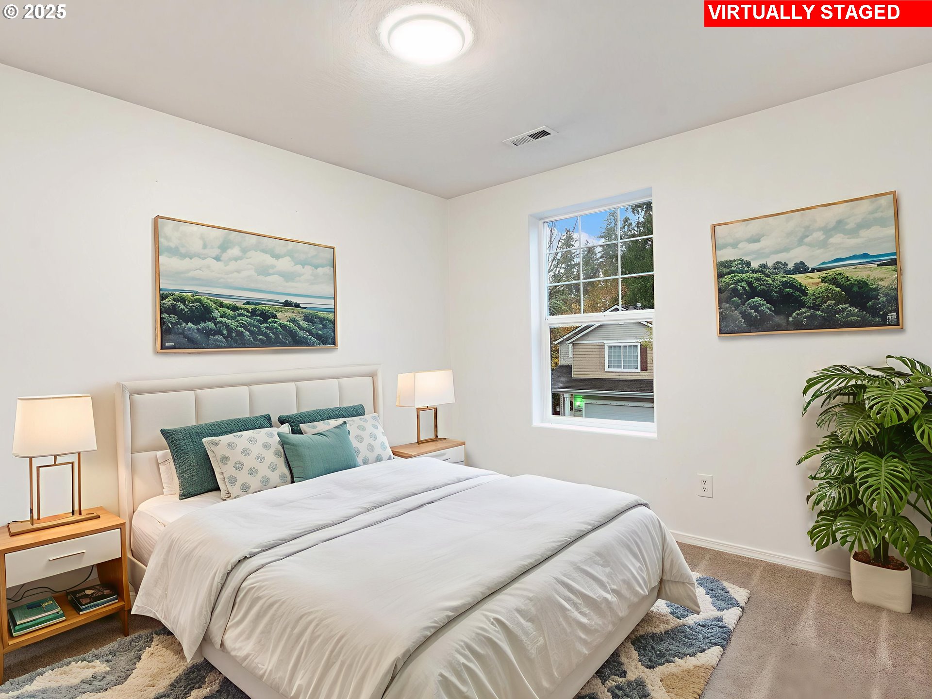 20744 Southwest Bingo Lane Beaverton, OR 97006 - Photo 21 of 26 a bedroom with a bed and a painting on the wall