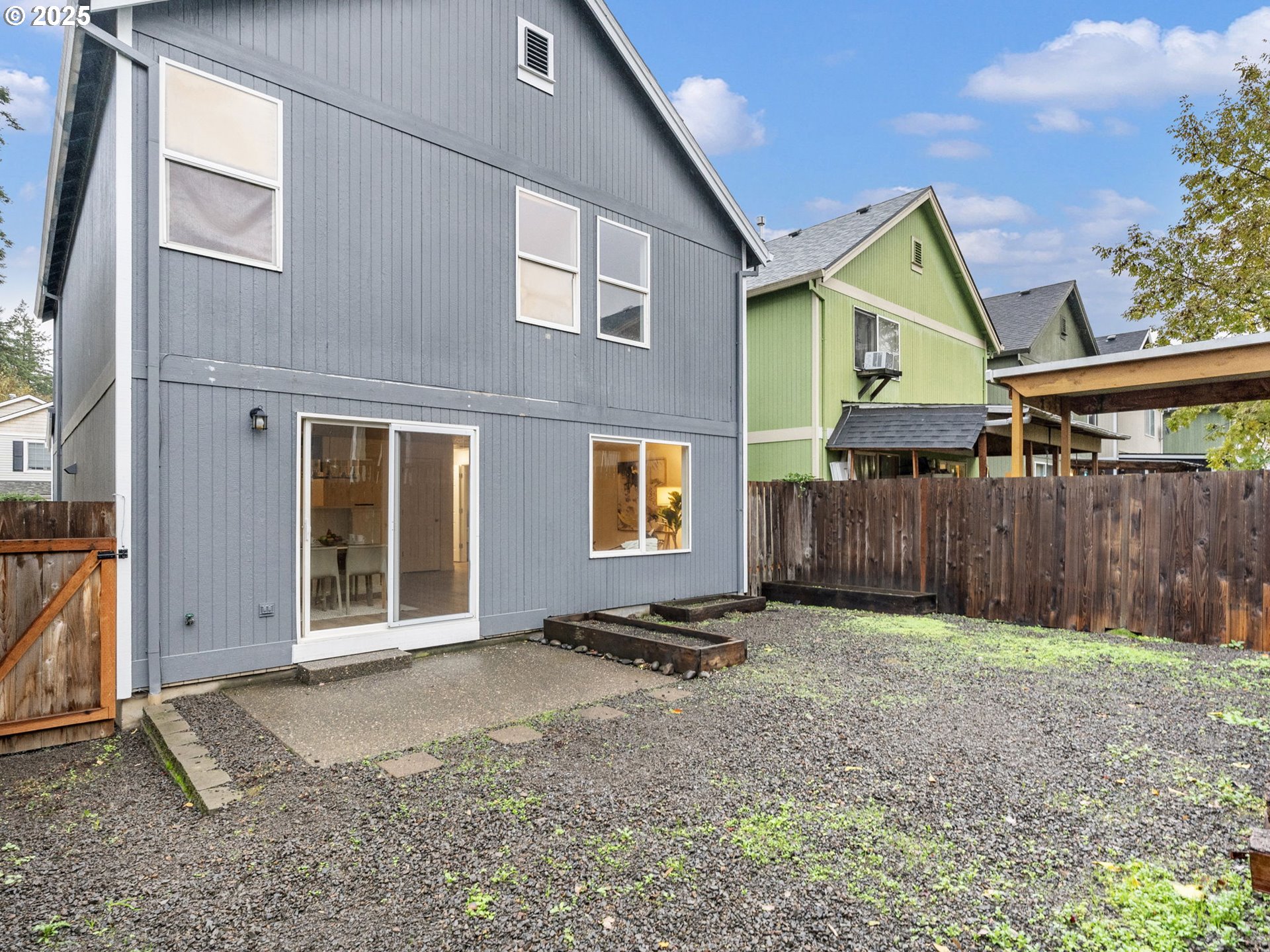 20744 Southwest Bingo Lane Beaverton, OR 97006 - Photo 26 of 26 a backyard of a house with barbeque oven and brick wall