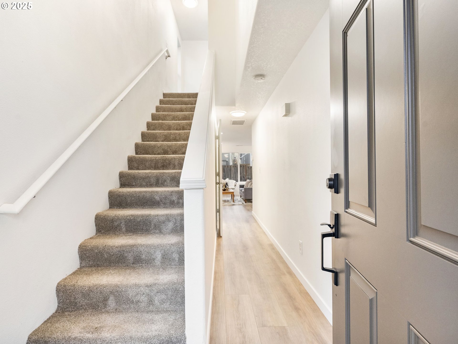 20744 Southwest Bingo Lane Beaverton, OR 97006 - Photo 4 of 26 a view of staircase with white walls