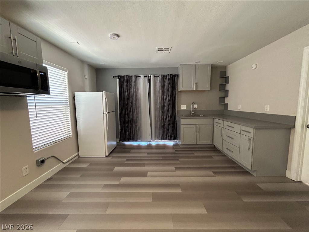 6538 Elm Spring Las Vegas, NV 89148 - Photo 14 of 29 Functional kitchen offers ample storage and a smart, compact layout.