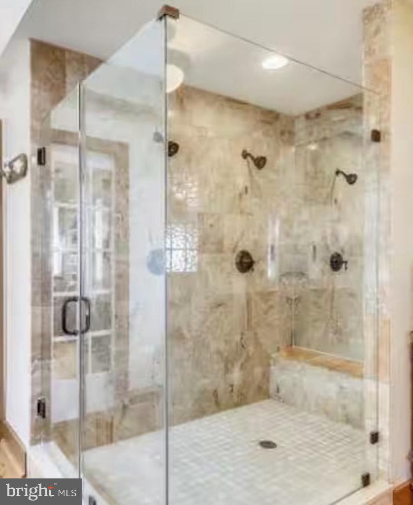 820 Bay Front Avenue North Beach, MD 20714 - Photo 13 of 19 a bathroom with a shower