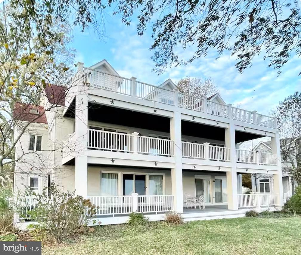 820 Bay Front Avenue North Beach, MD 20714 - Photo 18 of 19 a view of a big yard in front of house