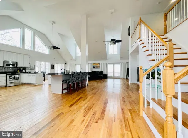 a bedroom with a bed and couch