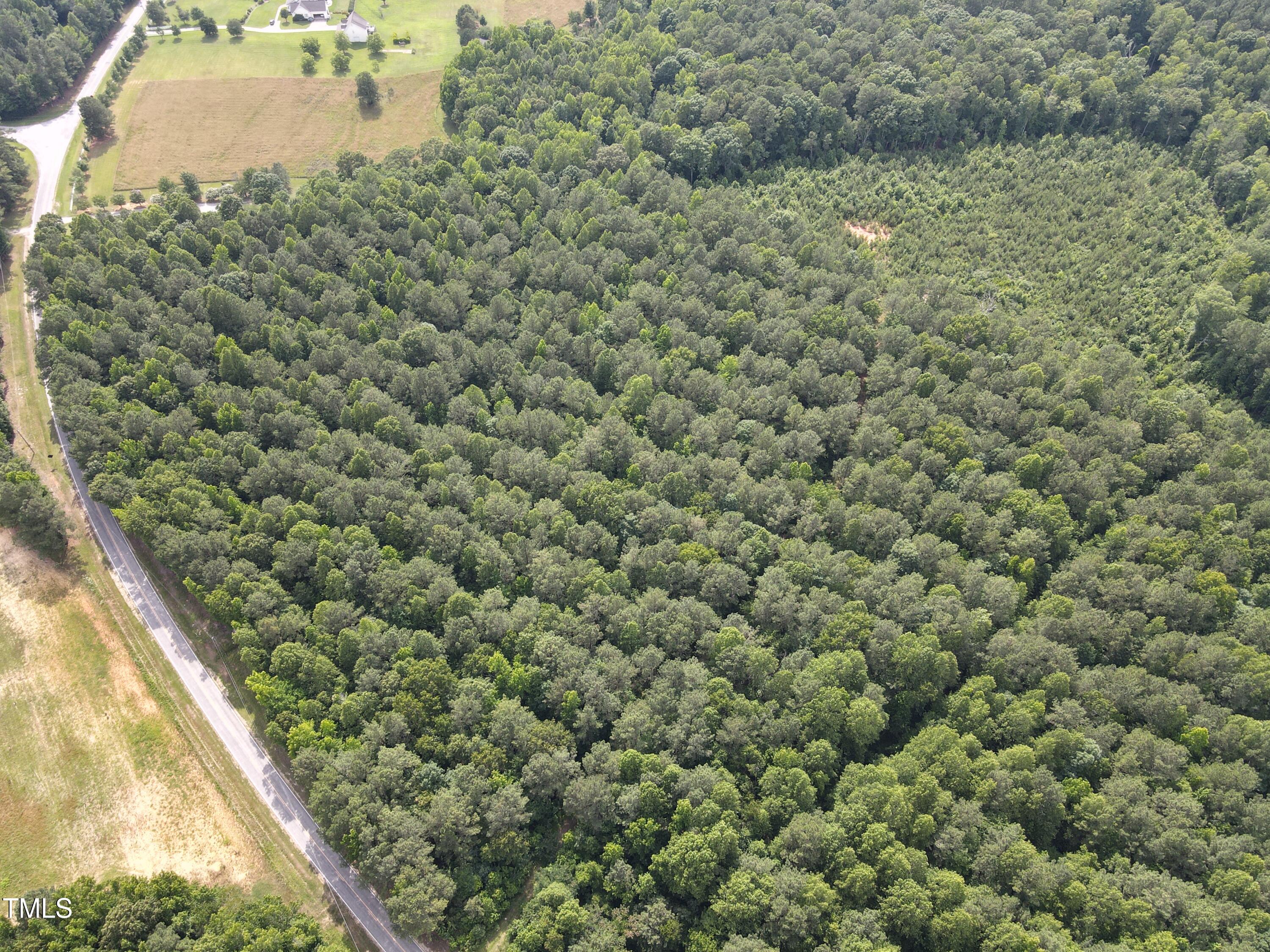 5-10 South Big Woods Road Spring Hope, NC 27882 - Photo 4 of 9 a view of a lake from a window