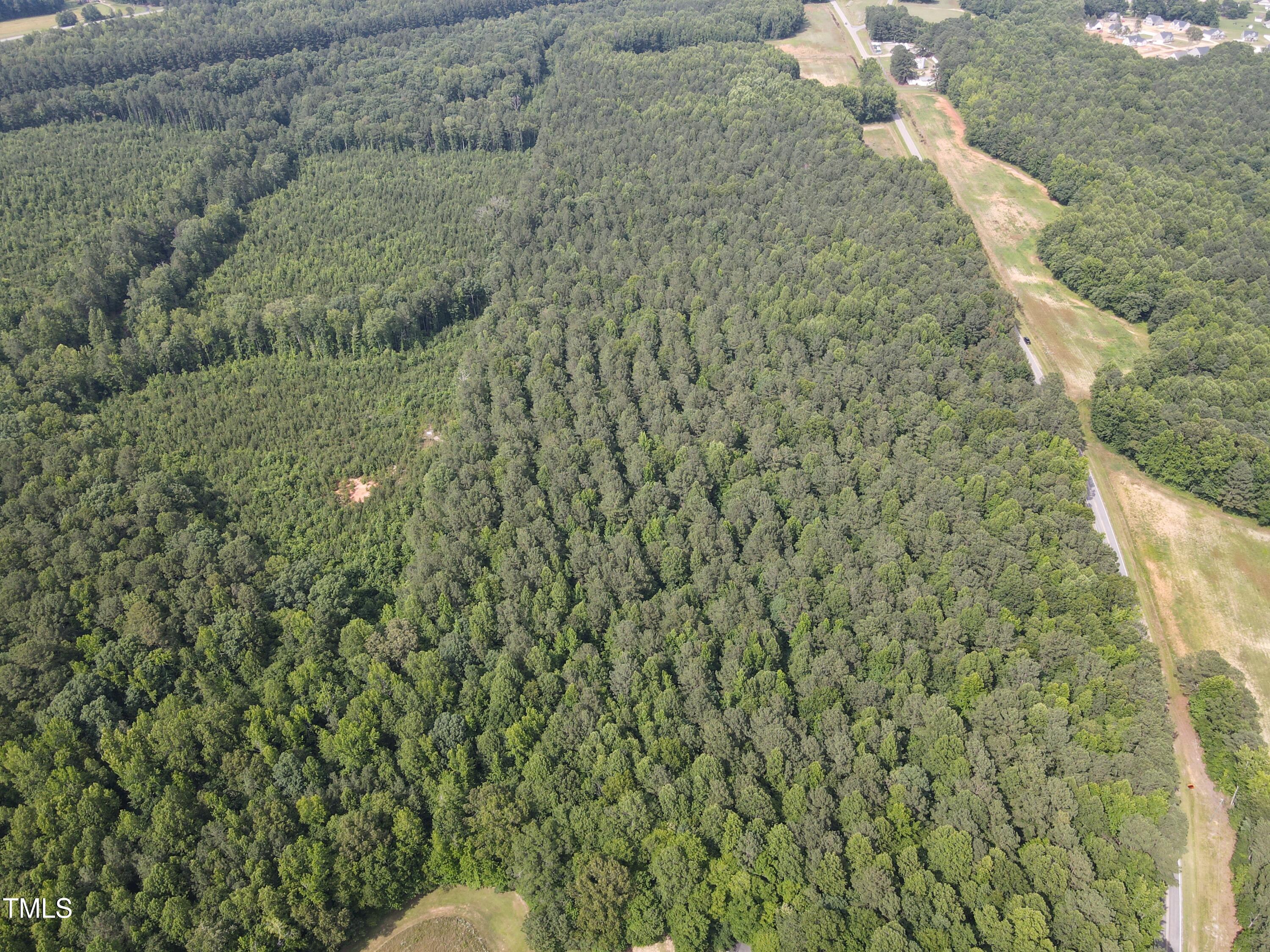 5-10 South Big Woods Road Spring Hope, NC 27882 - Photo 6 of 9 a view of a yard