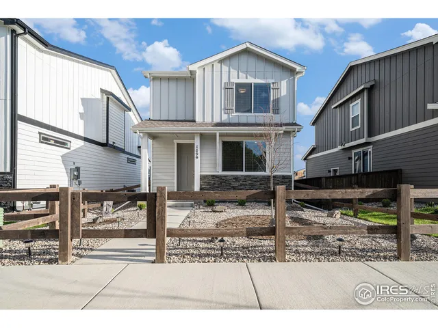 a front view of a house with street