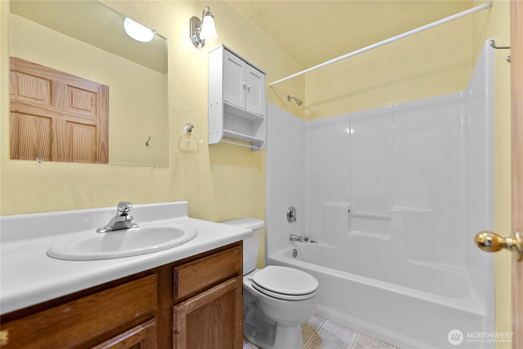 511 Bluff Street Winthrop, WA 98862 - Photo 22 of 38 a bathroom with a sink a toilet and shower