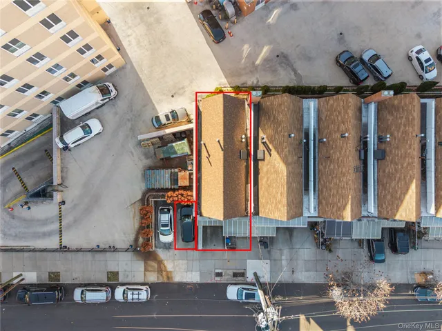 a bathroom with a sink a mirror and next to a window