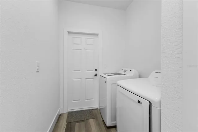 a utility room with dryer and washer