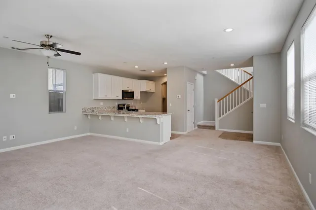 a view of staircase with white walls and white walls