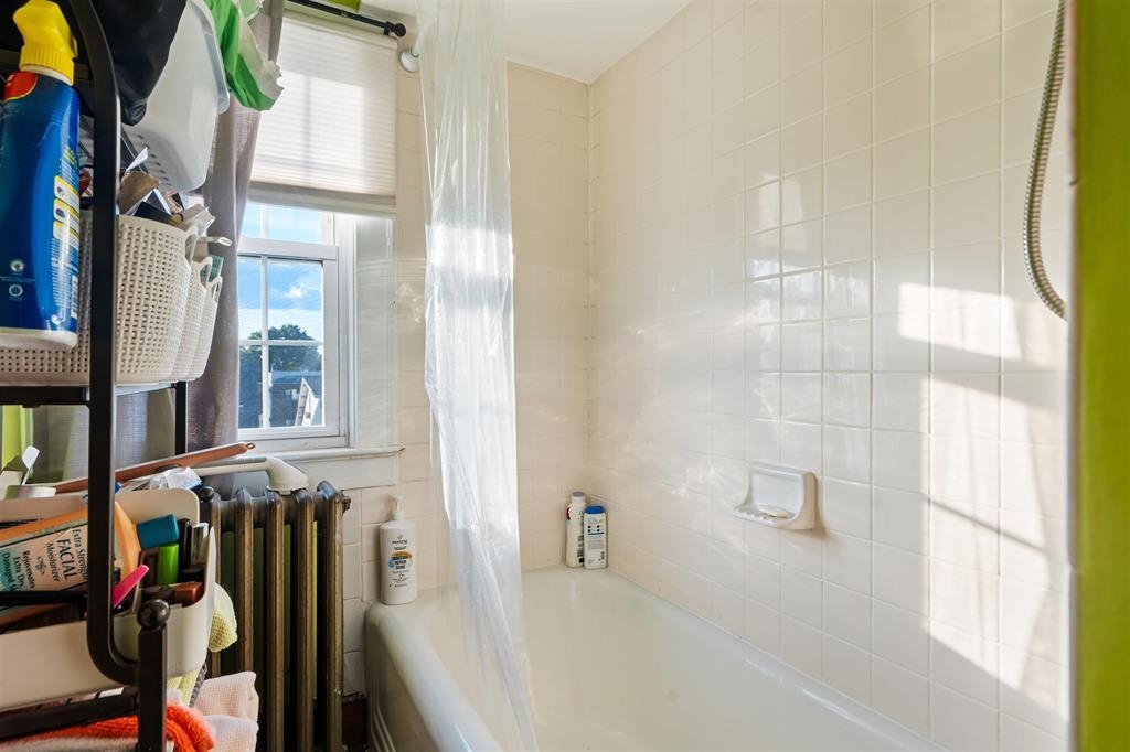 1041 Stonewall Lane, Unit 2 Secaucus, NJ 07094 - Photo 5 of 8 a view of walk in closet with clothes