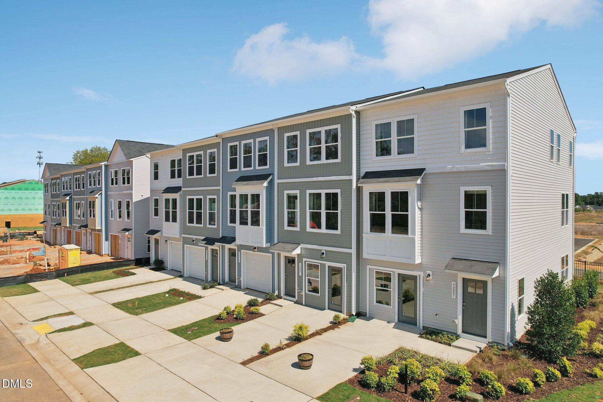 907 Formby Way Raleigh, NC 27610 - Photo 29 of 35 a view of a city that has tall buildings
