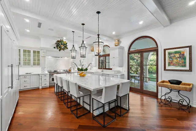 a spacious bedroom with a bed and a couch