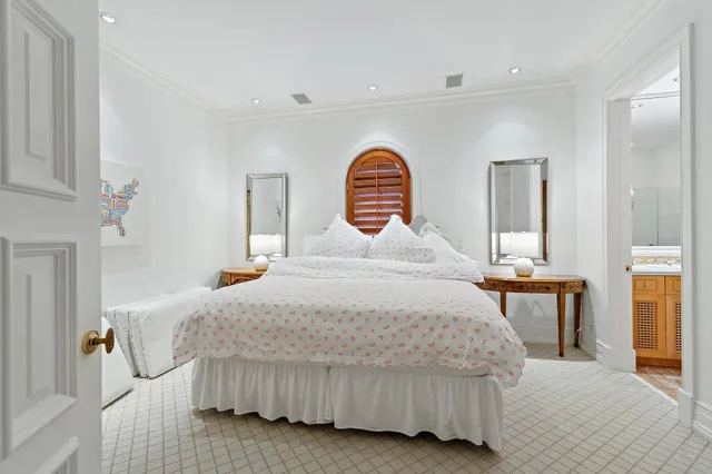 a view of a livingroom with furniture window and wooden floor