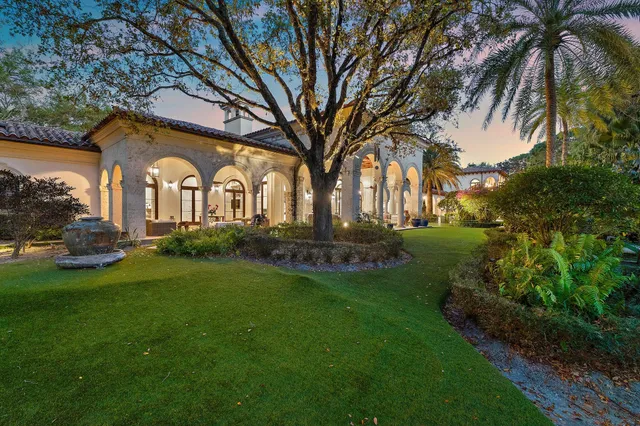 a view of a balcony with outdoor seating