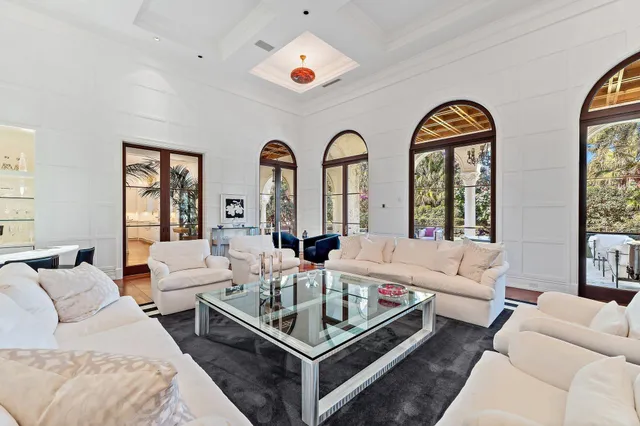 a view of a chairs and table in patio