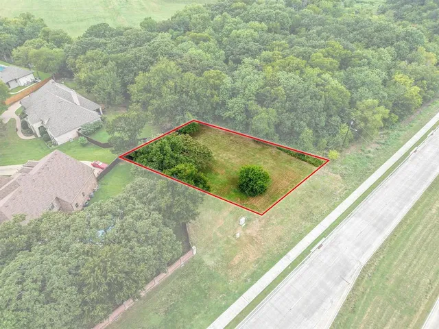 a view of a pool with a yard