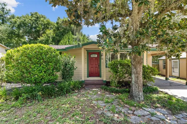 front view of a house with a small yard