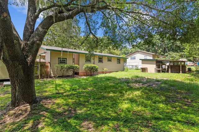 a house view with a garden space