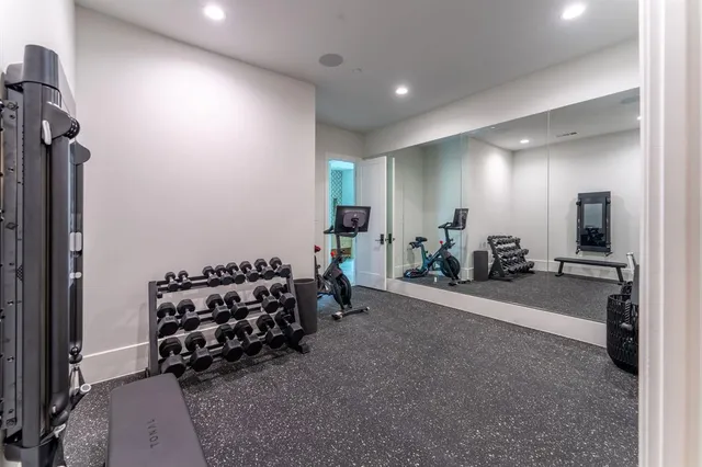 a utility room with sink dryer and washer