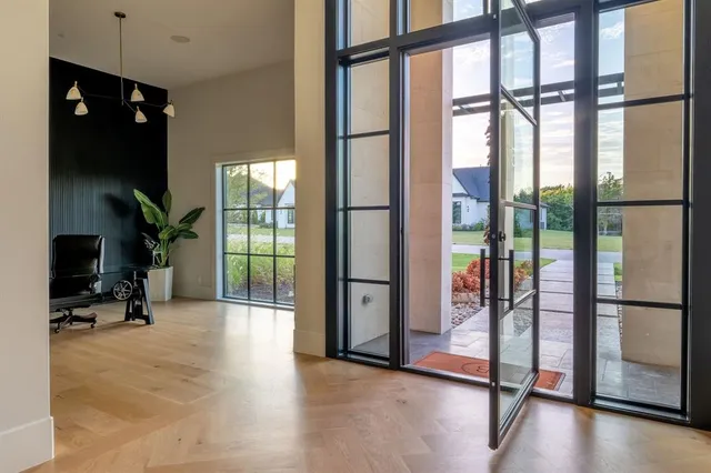 a view of livingroom with furniture and floor to ceiling window