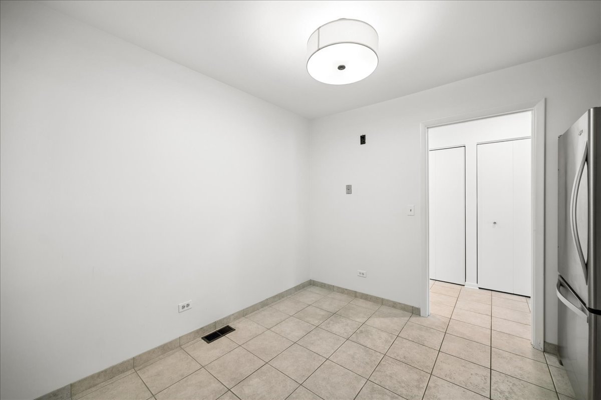 715 Ridge Road, Unit 1BN Wilmette, IL 60091 - Photo 11 of 15 a view of a room with cabinets