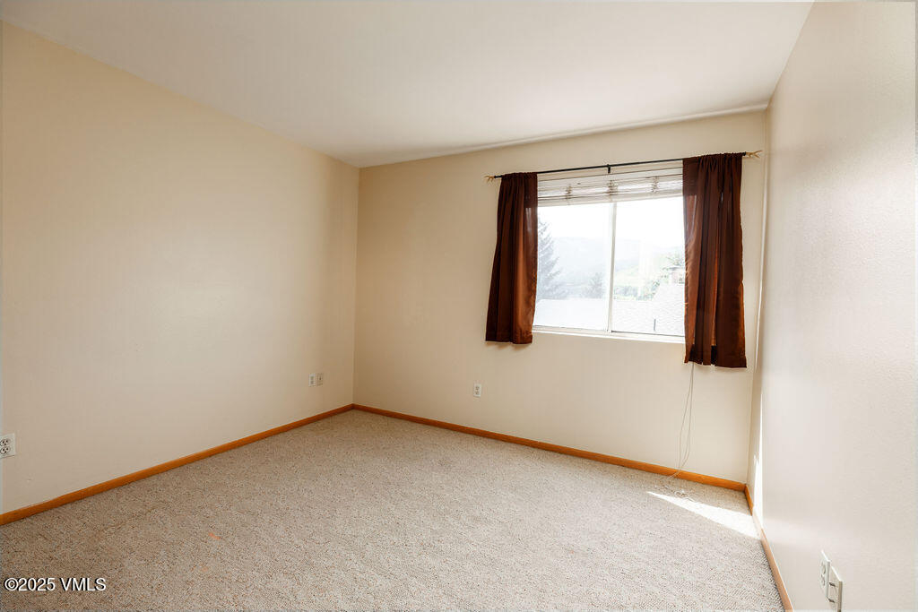 600 Nottingham Road, Unit 15 Avon, CO 81620 - Photo 8 of 10 an empty room with a window