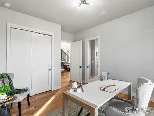 a view of a workspace with furniture