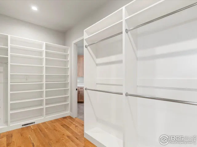 a view of an empty walk in closet