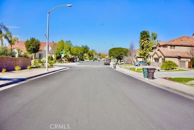 a view of a street with cars