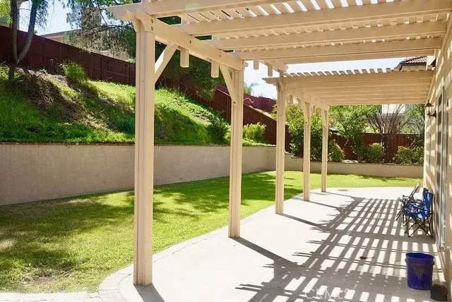 a view of a porch and garden