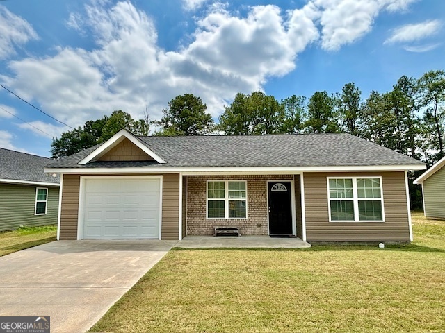 5 Runway Drive Northwest Rome, GA 30165 - Photo 1 of 1 a front view of a house with a garden