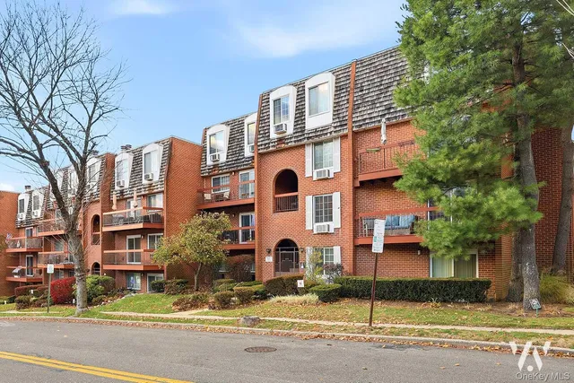 a front view of a building with street